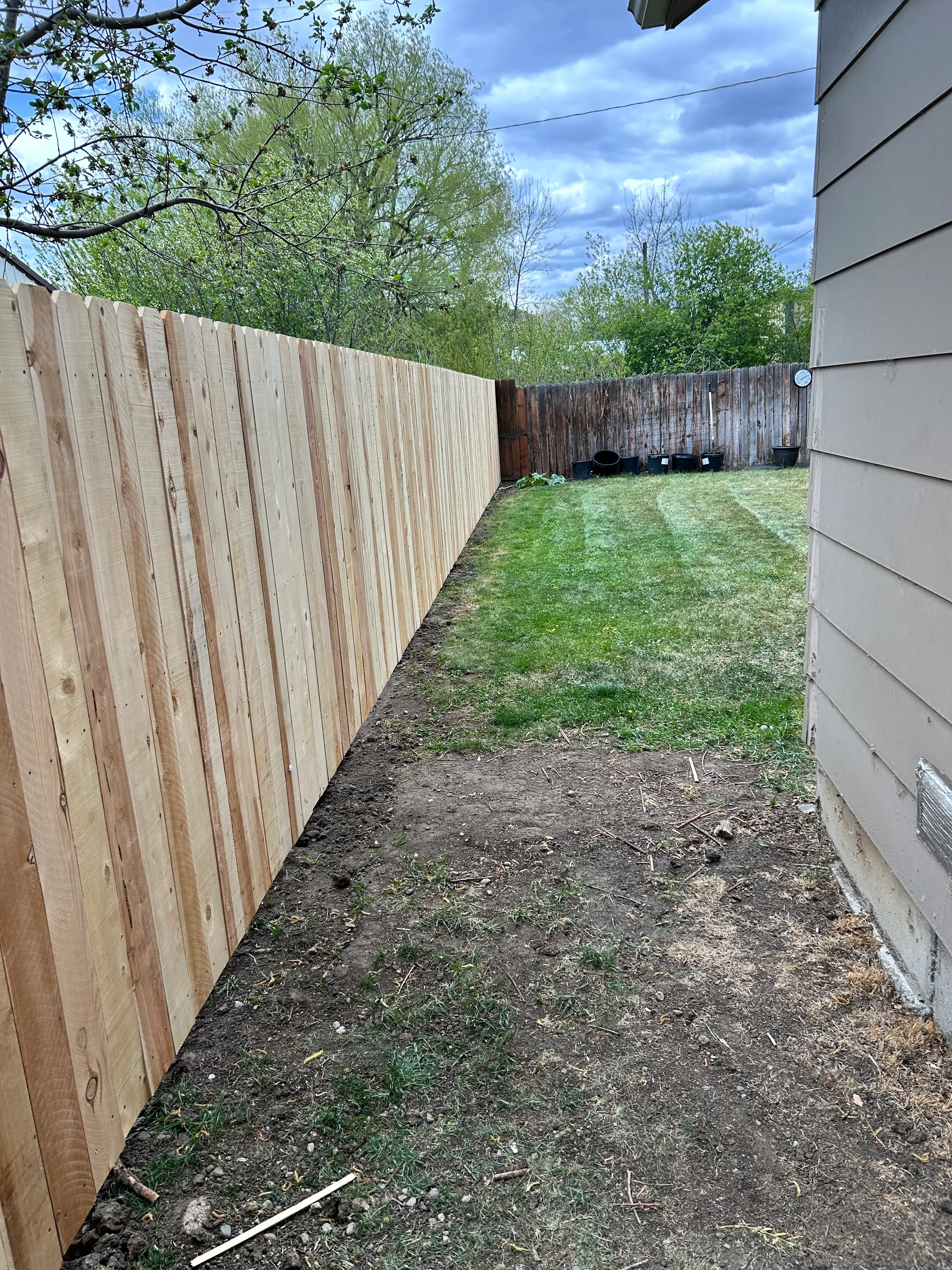 Cedar deck walkway in a backyard