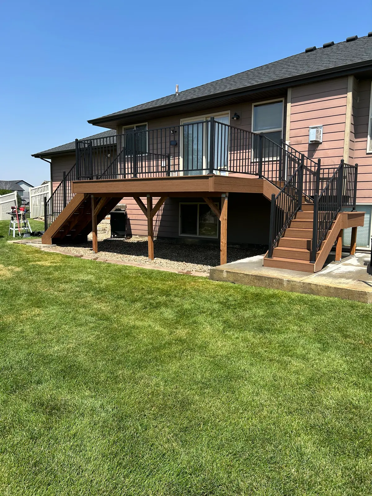 Composite deck over a walkout basement
