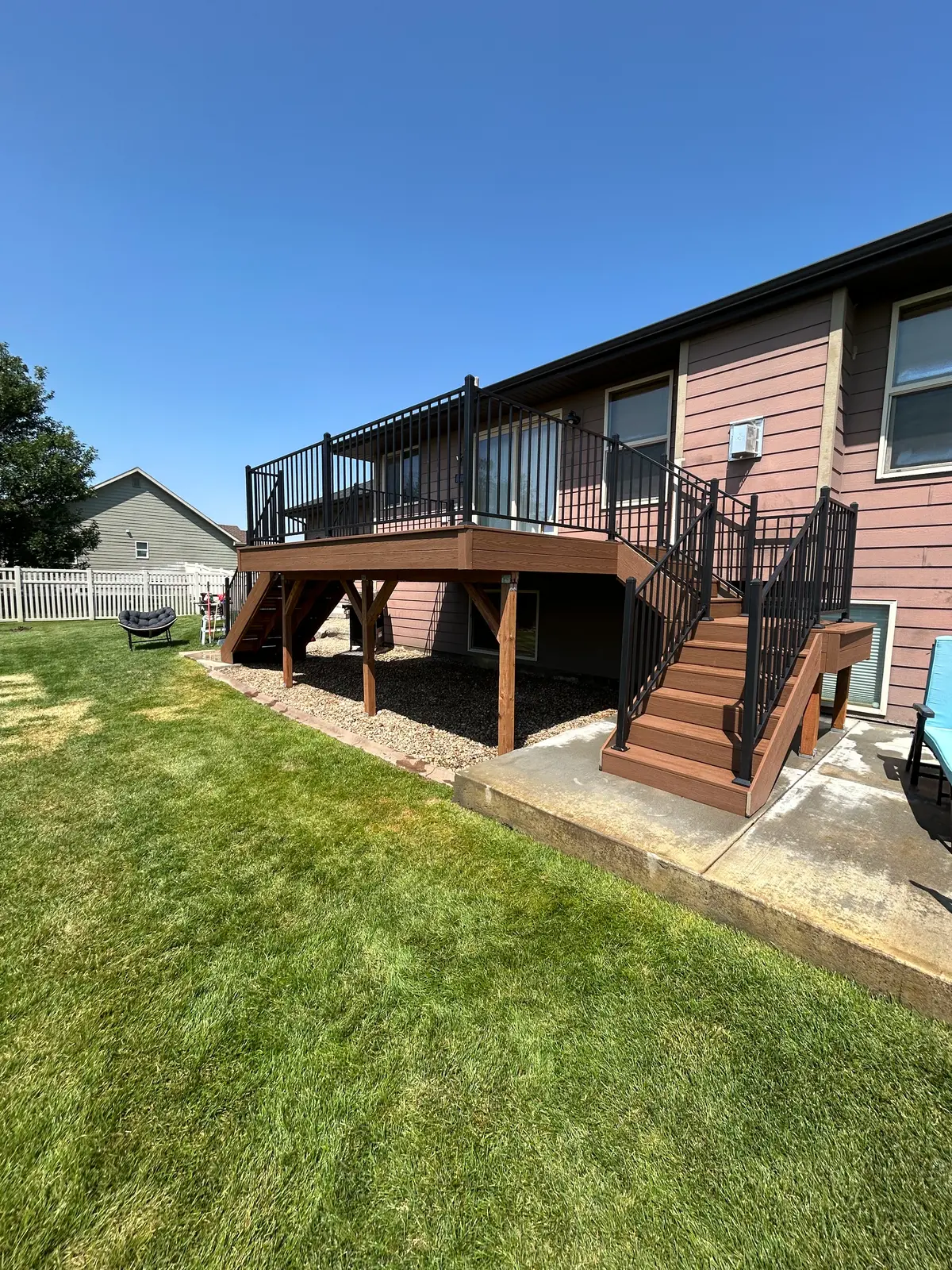 Elevated composite deck with stairs