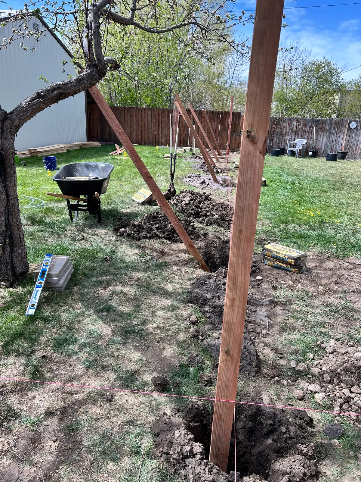 Fence post installation in progress
