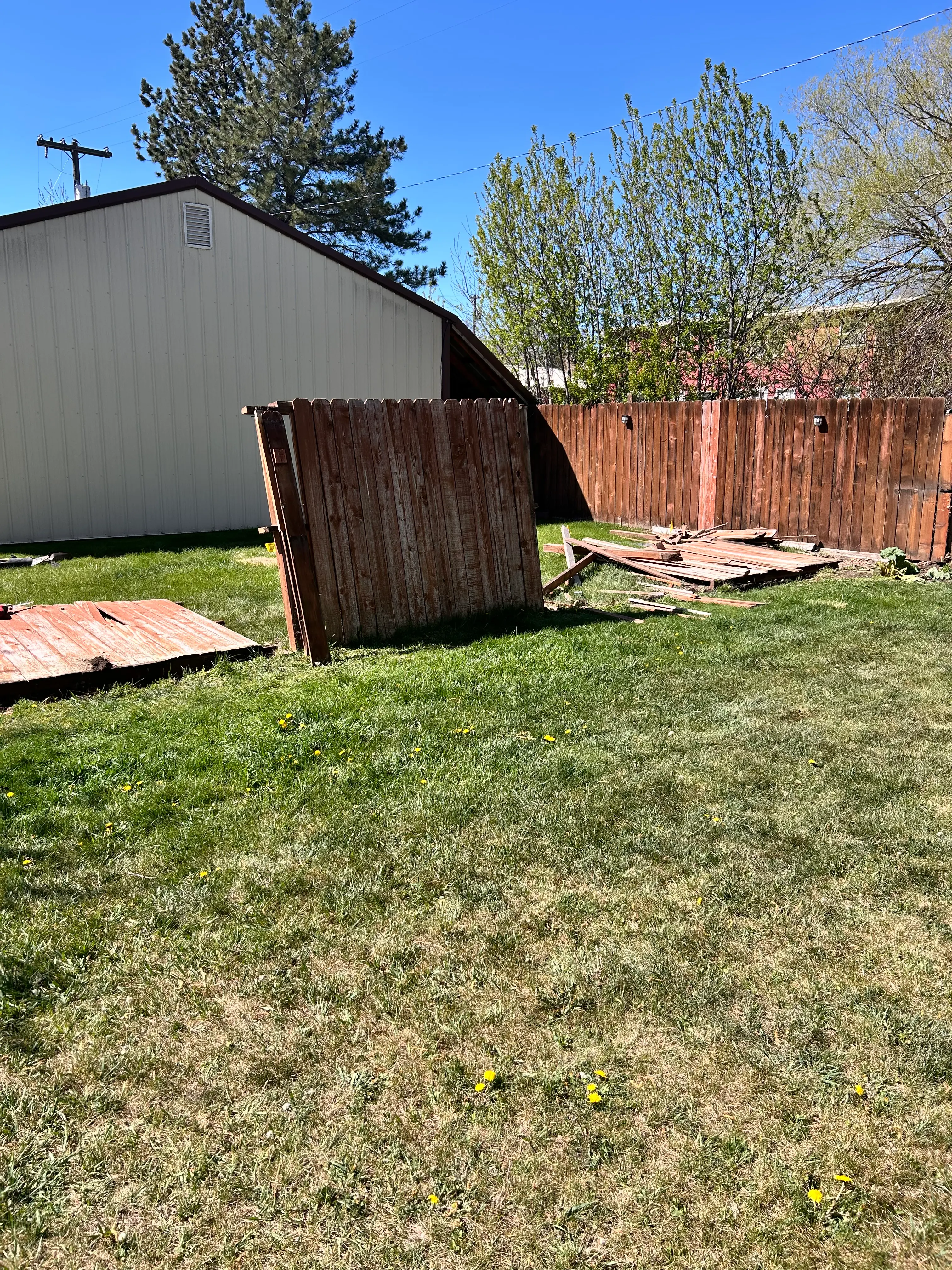 Weathered privacy fence, before replacement